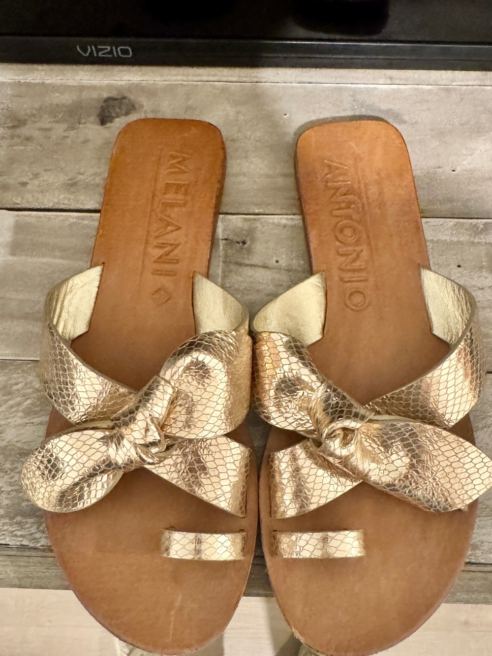 ANTONIO MELANI Metallic Gold Knot Toe-Loop Slide Sandals